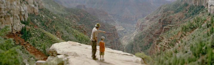 man with son at Grand Canyon