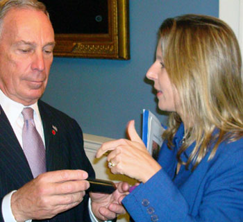 Isabelle Silverman shows Mayor Bloomberg the dirty heating oil Isabelle Silverman shows Mayor Bloomberg the dirty heating oil