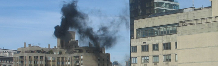Black smoke from a building burning No. 6 heating oil Black smoke from a building burning No. 6 heating oil