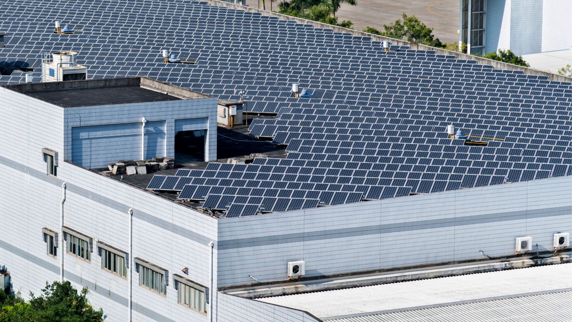A solar panel array on top of a school building