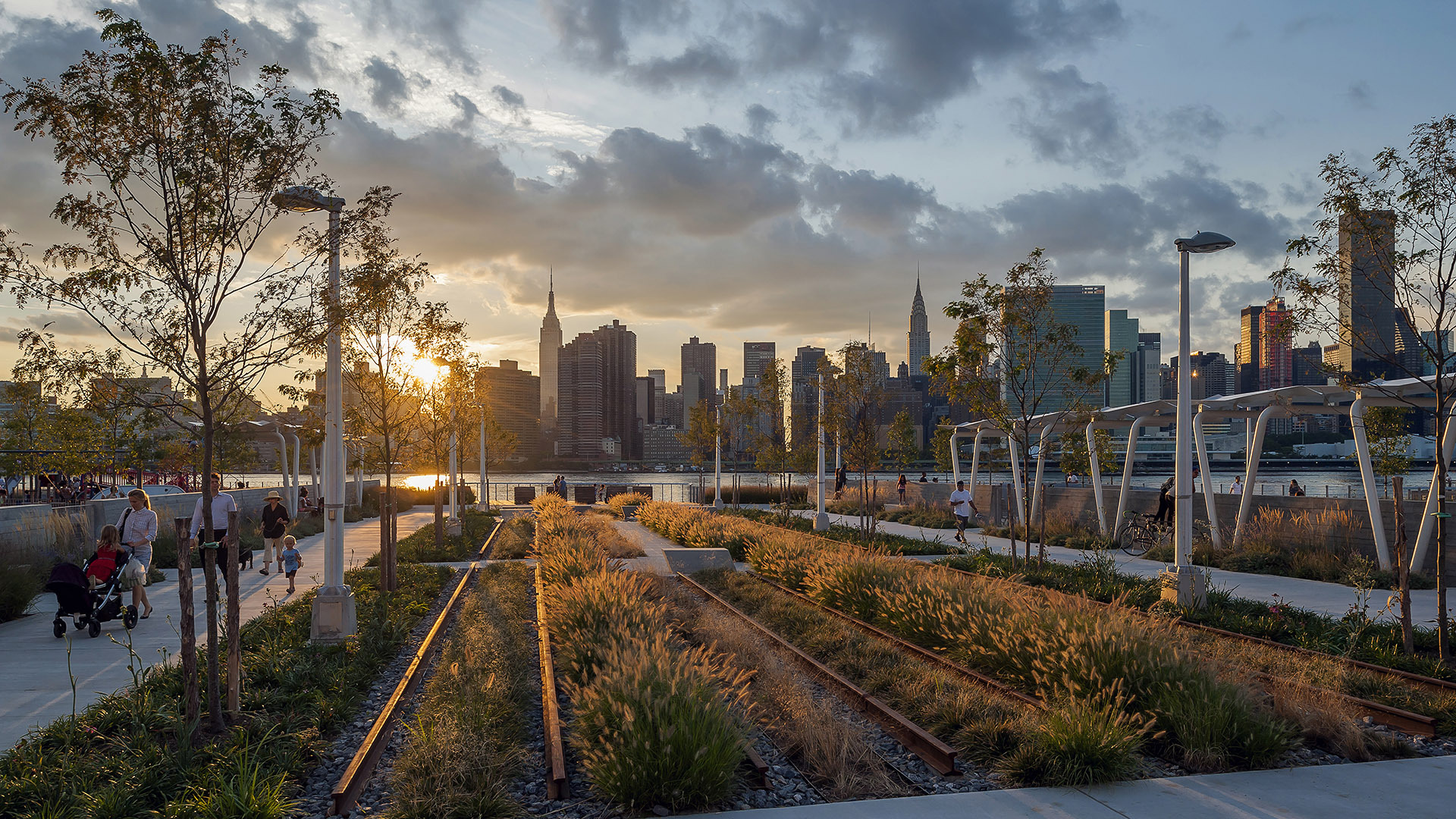 A lush garden with the New York City skyline as the backdrop