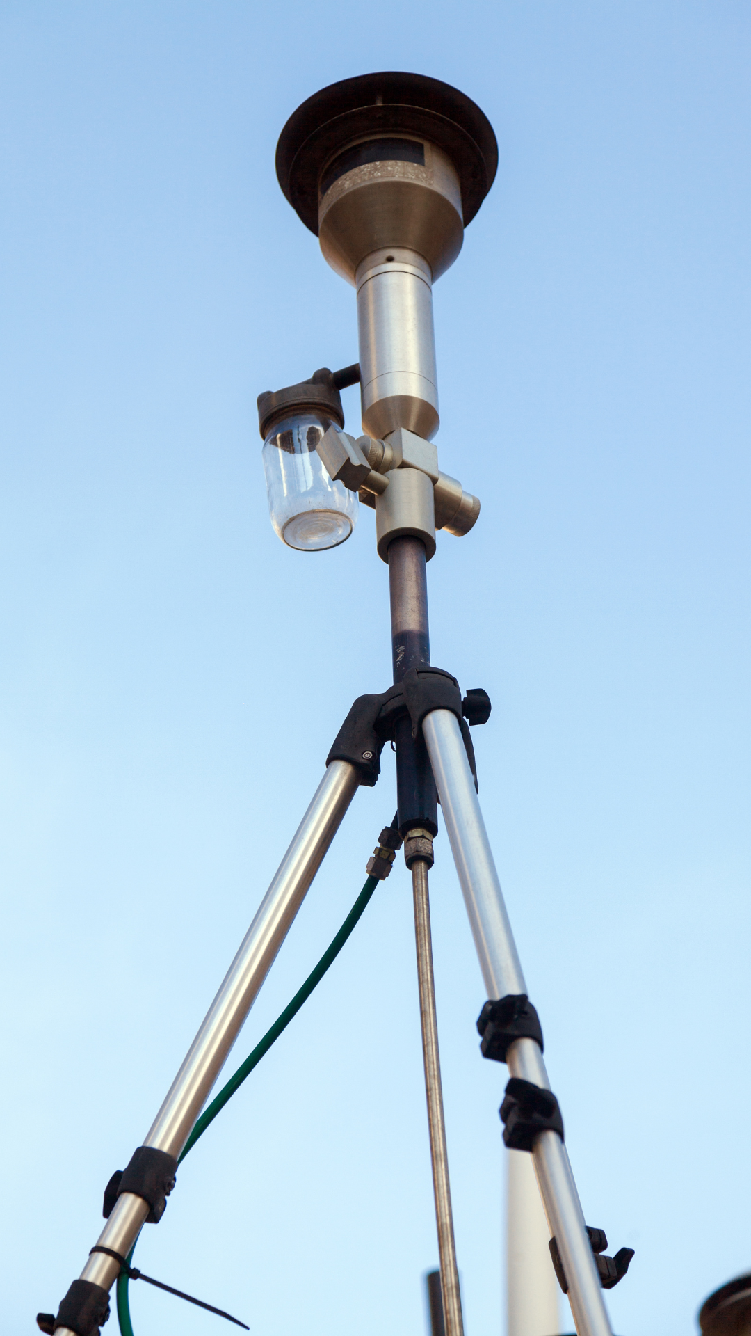 A low-angle shot of an air quality monitor