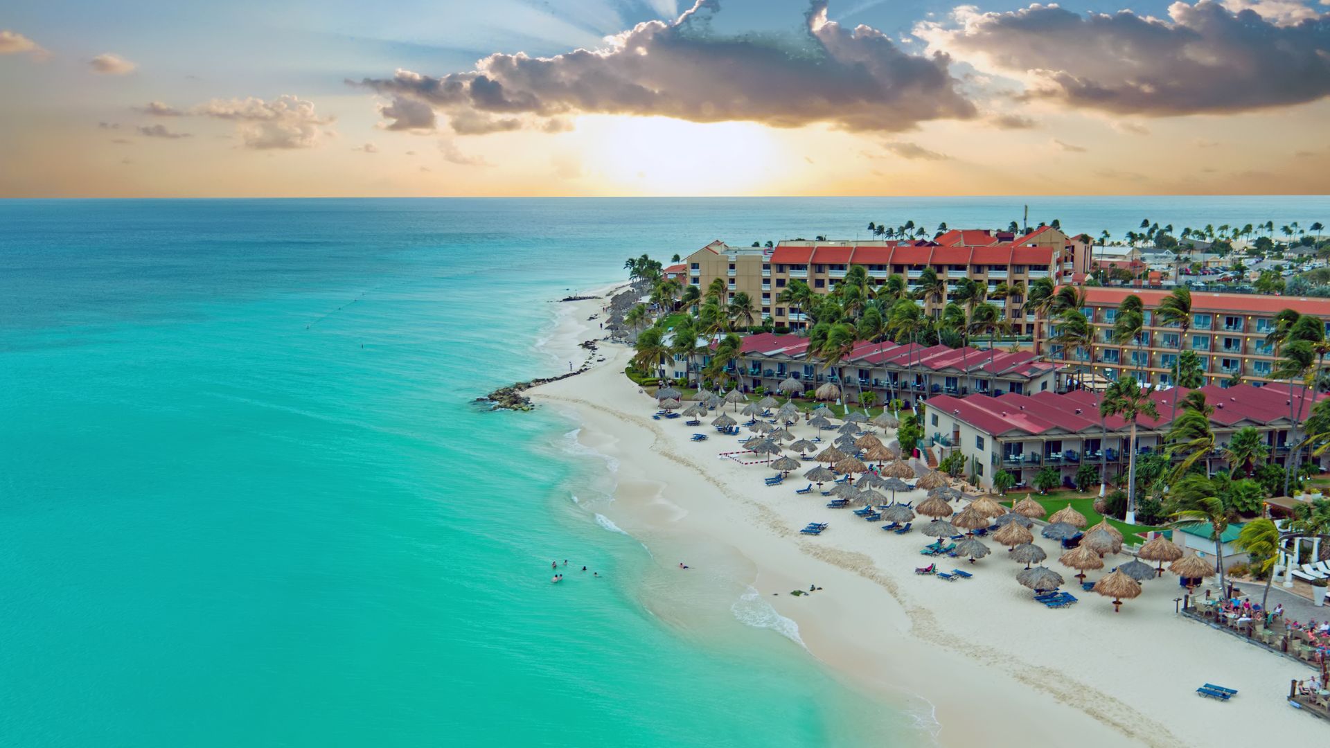 A resort in Aruba on the beach and simply stunning blue ocean waters