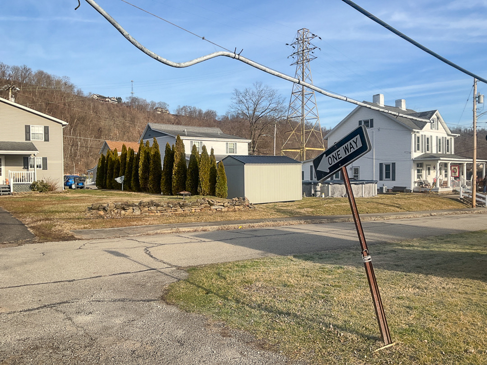 Lead cable sags between utility poles in Pennsylvania neighborhood