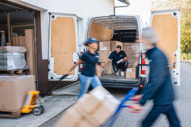 Shipping workers loading truck