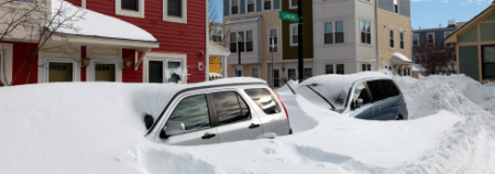 cars buried in snow