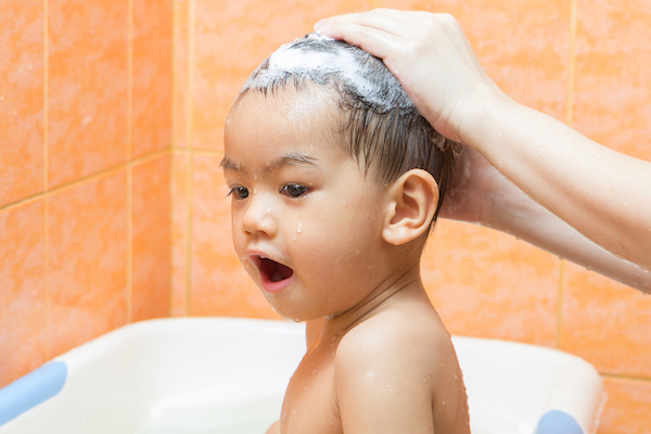 toddler getting hair washed toddler getting hair washed