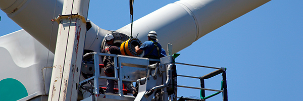 worker repairing turbine worker repairing turbine
