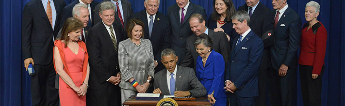 President Obama signing Lautenberg Act