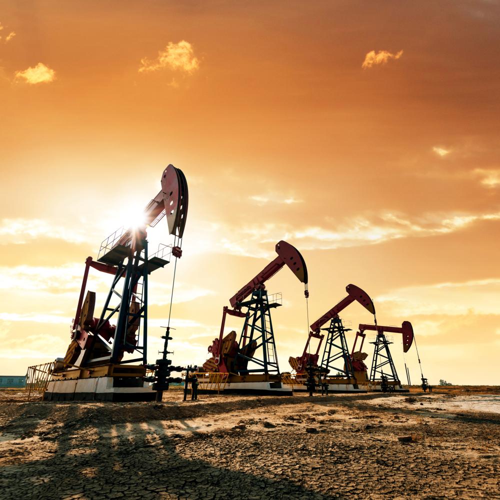 Oil pumps working under open sky.