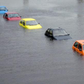 Line of cars submerged in floodwaterrs