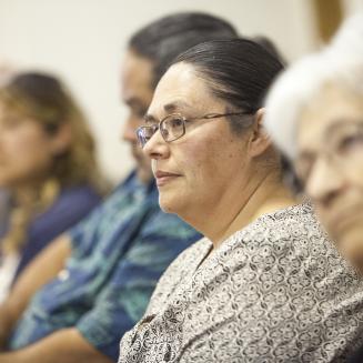 Olivia Gomez and other participants in California community water board meeting