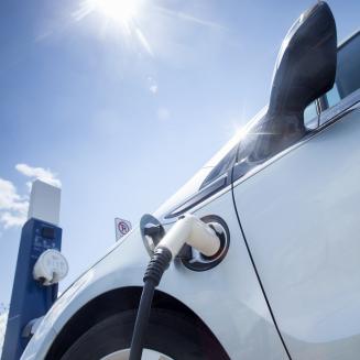 Electric car being charged