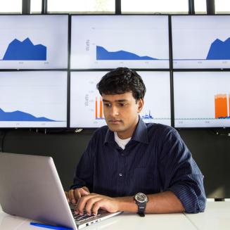 Image of man using laptop