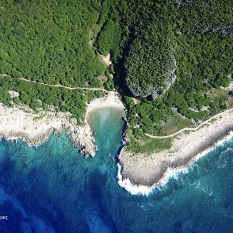 aerial shot of an island surrounded by ocean