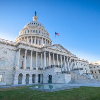 Low angled view of the U.S. Capitol East Facade Front in Washington, DC.