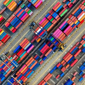 Overhead shot of a large row of shipping containers