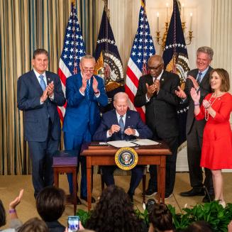 President Joe Biden signs the Inflation Reduction Act