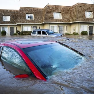 Cars in California submerged in flood waters
