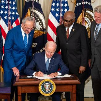 Joe Biden signing the Inflation Reduction Act