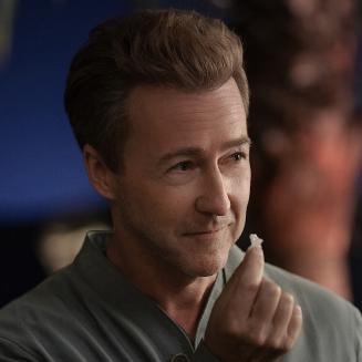 Ed Norton holds a piece of solid hydrogen in Glass Onion: A Knives Out Mystery