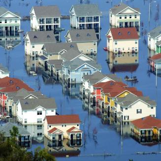 An overhead shot of flooded homes