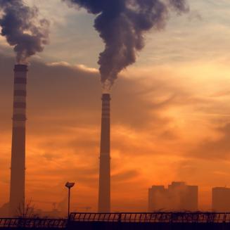 Smokestacks belching out smoggy smoke