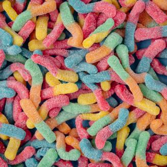 Close view of colorful gummy worms candy