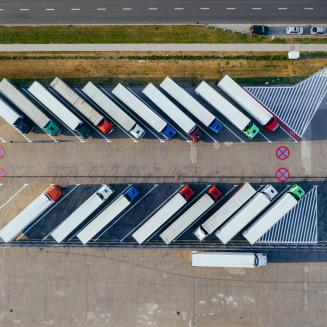 Aerial view of long-haul trucks in a parking lot