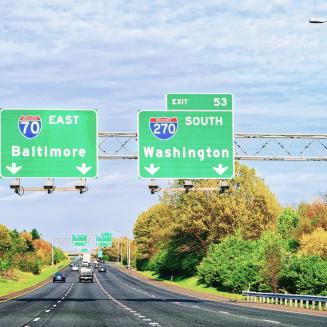 A highway in Maryland showing signs to choose between going to Baltimore or Washington