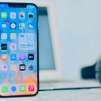 An iPhone standing up on its own like a terrifying, sentient phone