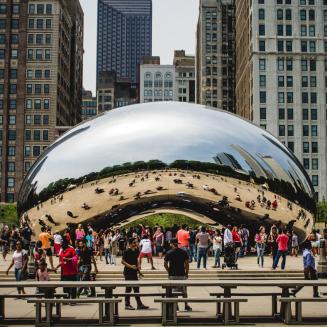 A shot of "the bean" in Chicago which is a big shiny, reflective, metallic orbish thing