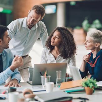 Diverse group of people meeting in an office setting