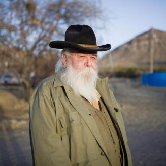 Randall Cater standing in front of mountains in Texas