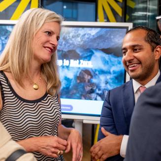 EDF's Elizabeth Sturcken talking with others at an event