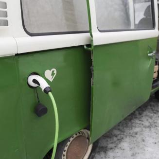 Electric van being charged in Finland during winter