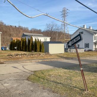Lead cable sags between utility poles in Pennsylvania neighborhood