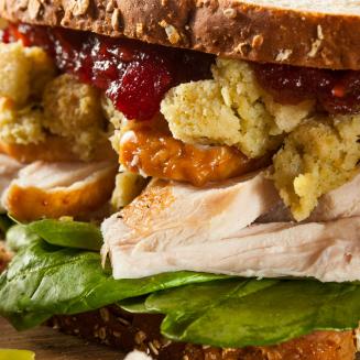 Close view of a sandwich made from Thanksgiving leftovers