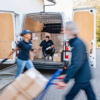 Shipping workers loading truck