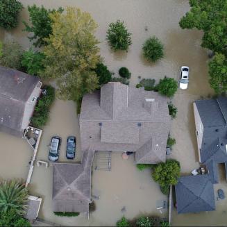A flooded residential neighborhood, viewed from overhead.