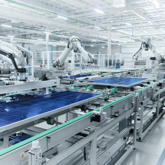 Machines in a lab manufacturing solar panels
