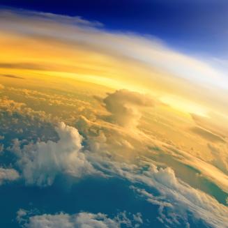 The Earth, viewed from above, with beautiful clouds.