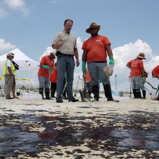 Workers cleaning up the BP oil spill