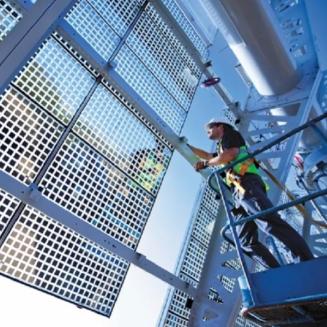 A worker working on solar panels