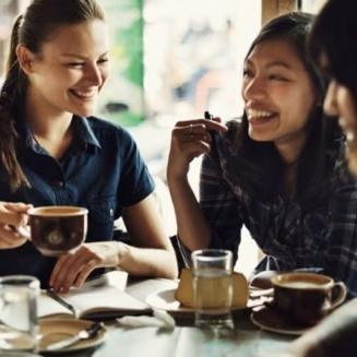 A group of friends having a meal together.
