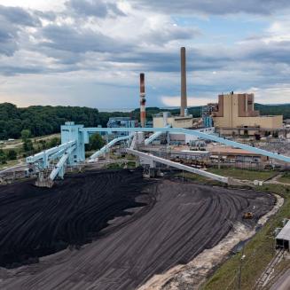Piles of coal outside of a coal power plant