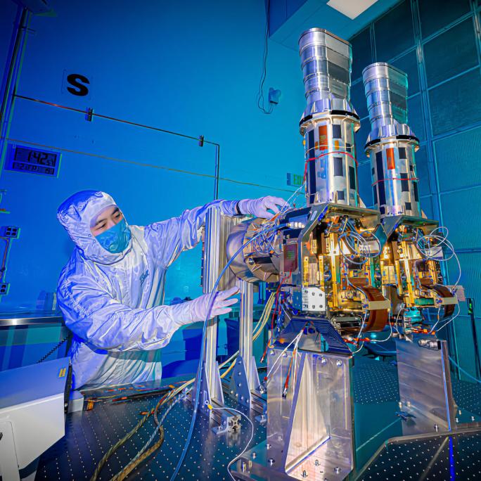 Person in lab preparing instrument for MethaneSAT methane-tracking satellite