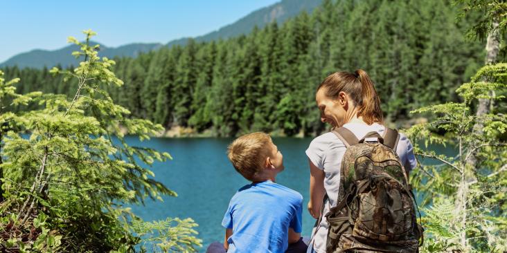 Mother and child taking a break from a nature hike