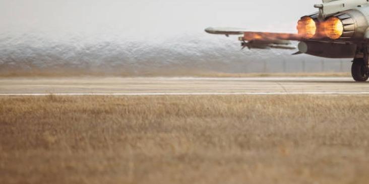 A jet emitting exhaust from jet fuel