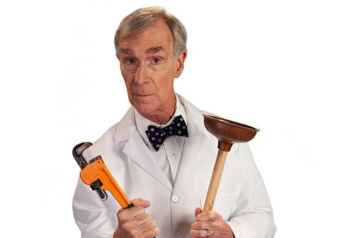 Bill Nye holding a wrench in one hand and a plunger in the other